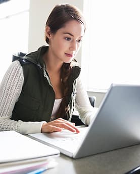 Woman working on a laptop