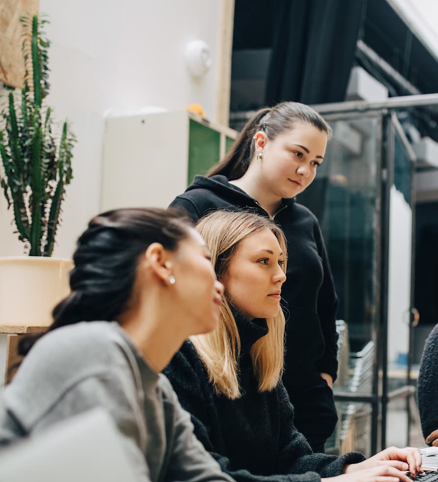 Team working together at a laptop